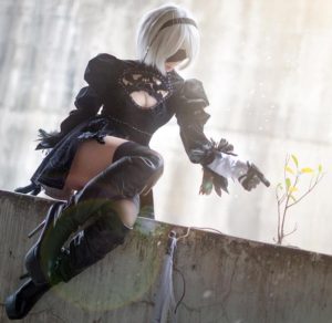 hane ame 2b nier automata cosplay big sexy sitting pose on a wall