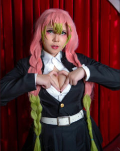 uy uys cosplay of mitsuri kanroji from demon slayer a thick and sexy pose