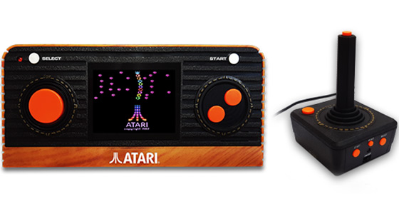 atari 2600 returns as a new compact handheld console and innovative plug and play tv joystick