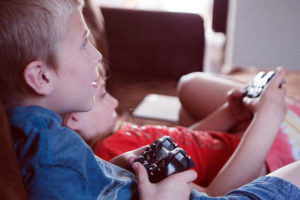 some kids playing on the ps4